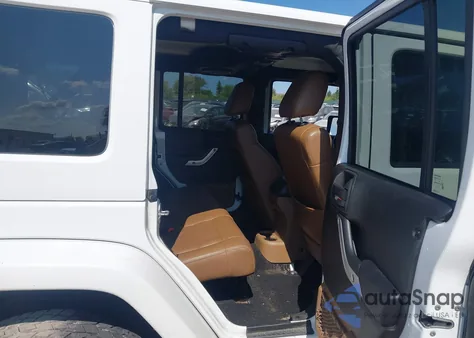 2011 Jeep Wrangler Unlimited Sahara z USA, uszkodzony, nr VIN 1J4BA5H15BL576551